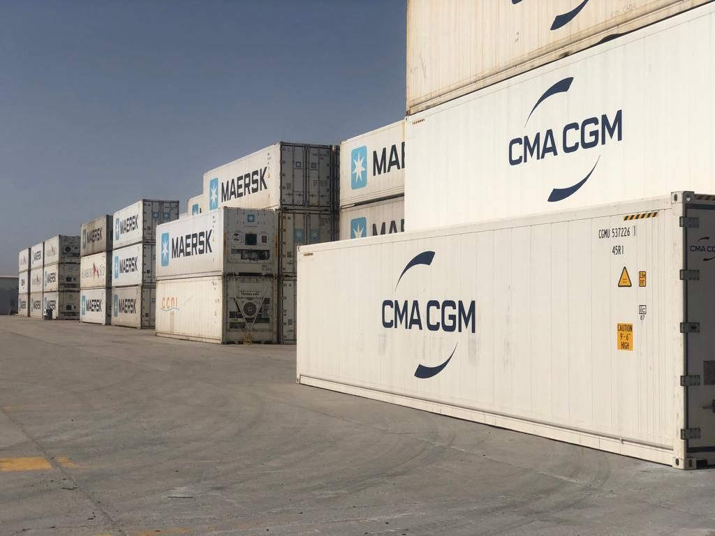 Refrigerated containers in a logistics yard
